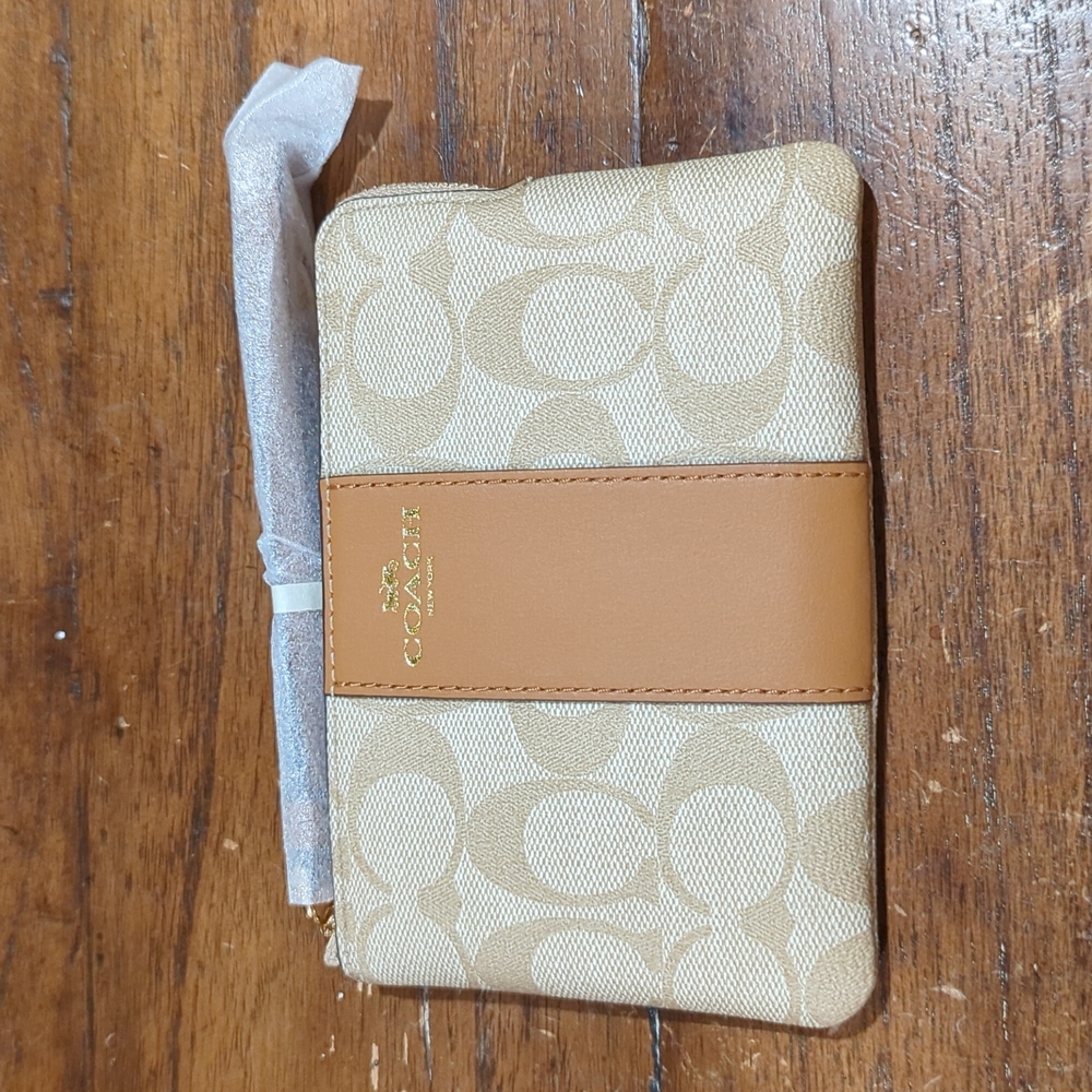Coach wristlet khaki and saddle color